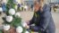 Relatives of prisoners of war decorated a Christmas tree with balloons bearing the names of soldiers in Dnipro, southeastern Ukraine, on December 24. 