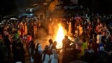 Despite heavy rain and cold temperatures, Norouz celebrations began at 3:30 a.m. on March 21 in Victory Park in the Tajik capital, Dushanbe, with a large gathering of people who welcomed the spring equinox around a bonfire.