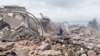 A rescuer with a dog works at the site of the blast in Sergiyev Posad on August 9.