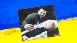 Плакат на митинге в Латвии в годовщину масштабного вторжения России в Украину, иллюстративное фото 