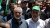 Șeful biroului politic al Hamas, Ismail Haniyeh (stânga), și liderul Hamas din Fâșia Gaza, Yahya Sinwar (dreapta), sunt dintre personajele cele mai cunoscute ale grupării.