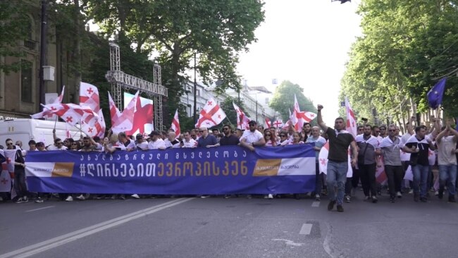 Georgian 'Foreign Agents' Bill Sparks Mass Rallies On Both Sides Of The Issue
