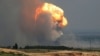 Дым и пламя после взрыва на российском военном полигоне в Кировском районе Крыма, 19 июля 2023 года