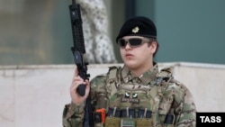 Ramzan Kadyrov’s son Adam attends a review of Chechen troops and military hardware in Grozny earlier this year.