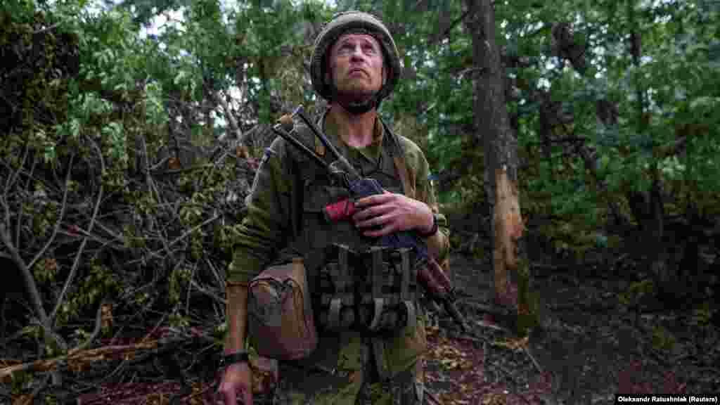 A Ukrainian soldier scans the sky for enemy drones near his position close to Chasiv Yar.&nbsp;&nbsp; &quot;Today, in all directions, our soldiers advanced, and it is a happy day. I wish the boys more days like this,&quot;&nbsp;Zelenskiy&nbsp;said.