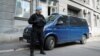 Bosnia-Herzegovina - Police officer and police car in front of Canton Sarajevo Police office, Sarajevo, 9May2023