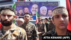 Iranians attend the funeral of seven Revolutionary Guards Corps members killed in a strike on the country's consular annex in Damascus, which Tehran blamed on Israel, on April 5, during their funeral procession in Tehran.