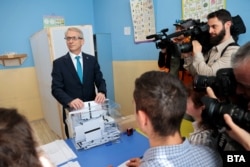 Prime Minister Nikolay Denkov casts his ballot in Sofia on October 29.