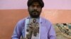 Ілюстраційне фото: житель індійського міста Гайдарабад тримає фото свого брата Мохаммеда Асфана, який був відряджений на війну проти України з російського Ростова-на-Дону, лютий 2024 року