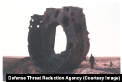 The massive steel mouth of an ICBM silo after its demolition at an unspecified location in Ukraine in 1992.