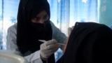 An Afghan Province's Only Woman Dentist Inspires Her Patients