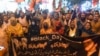 Supporters of former Prime Minister Imran Khan shout anti-government slogans during a protest in Quetta on August 5.