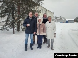 Friends greet Akhmetshin after his release.