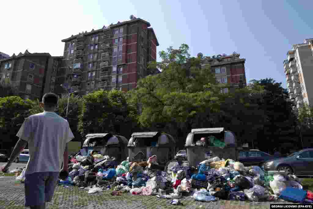 Garbage overflows from containers on July 10 in Skopje, where public workers did not empty garbage containers in the city from July 7 in protest at low wages.&nbsp;