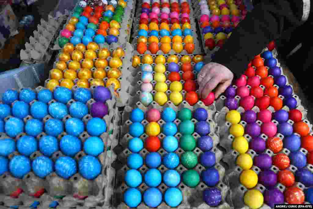 Hand-painted Easter eggs are displayed on a stall fat a farmers market in Belgrade, Serbia.&nbsp;