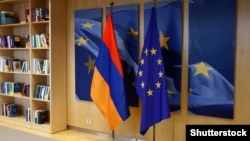 Belgium - EU and Armenian flags are displayed at the EU headquarter in Brussels, March 5, 2019.