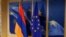 The flags of Armenia and the EU in the European Council building in Brussels (file photo)