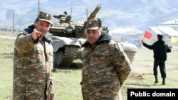 Nagorno-Karabakh - General Jalal Harutiunian (left) oversees a military exercise.