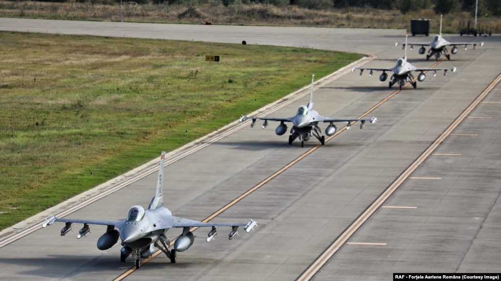 American F-16s taxi on the runway at the newly opened European F-16 Training Center in Borcea, Romania.