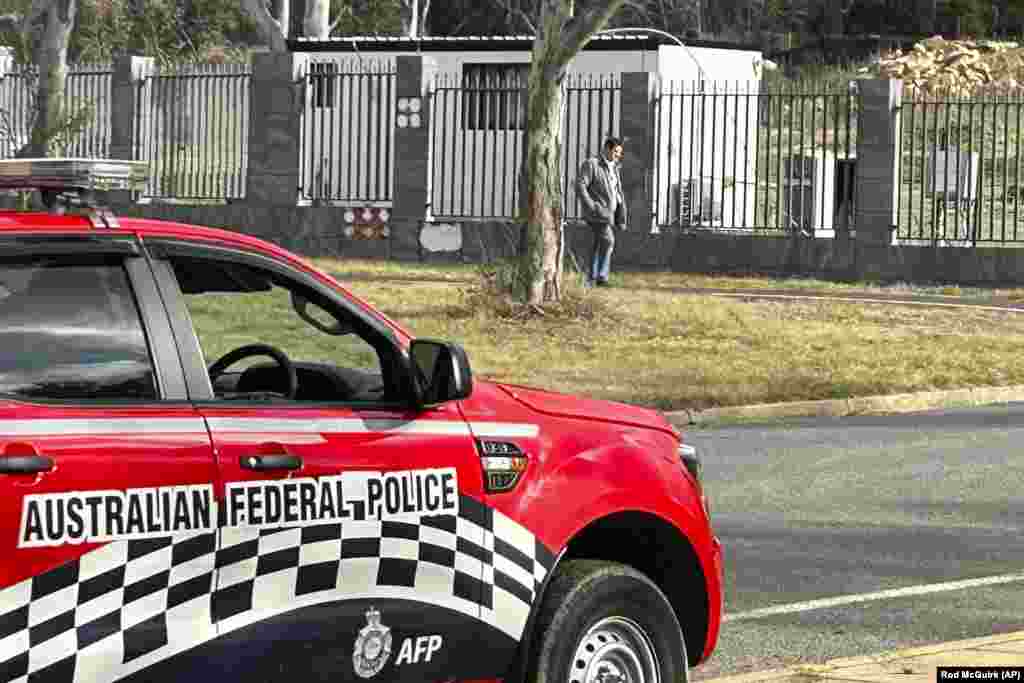 A June 23 photo shows a police car near the structure where the Russian diplomat was living on June 23.&nbsp;