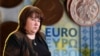Финансовият министър Росица Велкова. На фона са банкноти и монети евро. Колаж