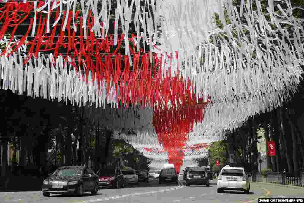 A central street is decorated with the colors of the Georgian national flag in Tbilisi on Georgia&#39;s Independence Day on May 26.