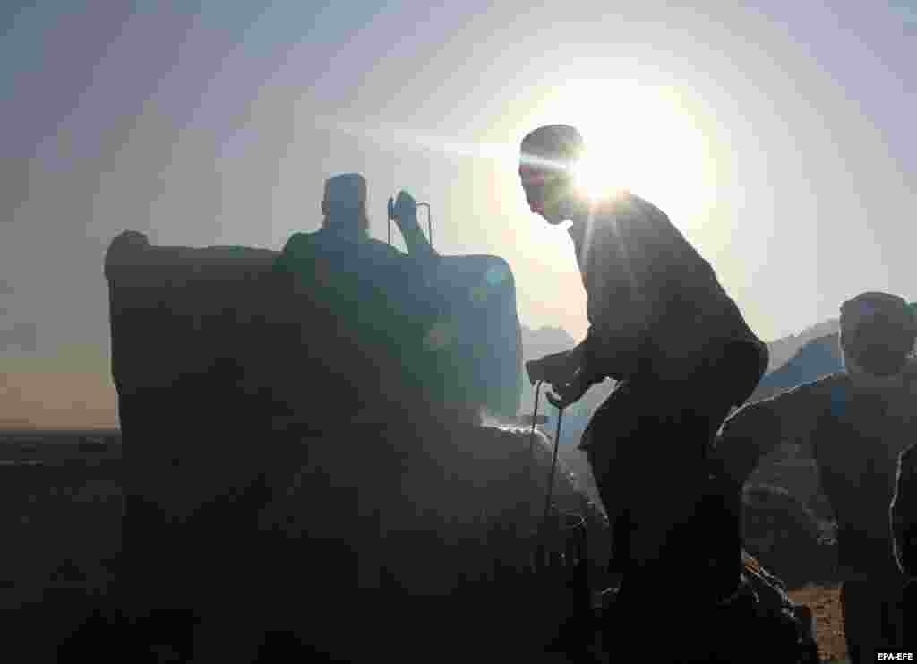 Workers process grapes under the hot summer sun. According to the World Food Program, 15.3 million people face acute food insecurity, and 2.8 million people face emergency levels of food insecurity. Acute malnutrition is above emergency thresholds in 25 out of 34 provinces in Afghanistan. &nbsp;