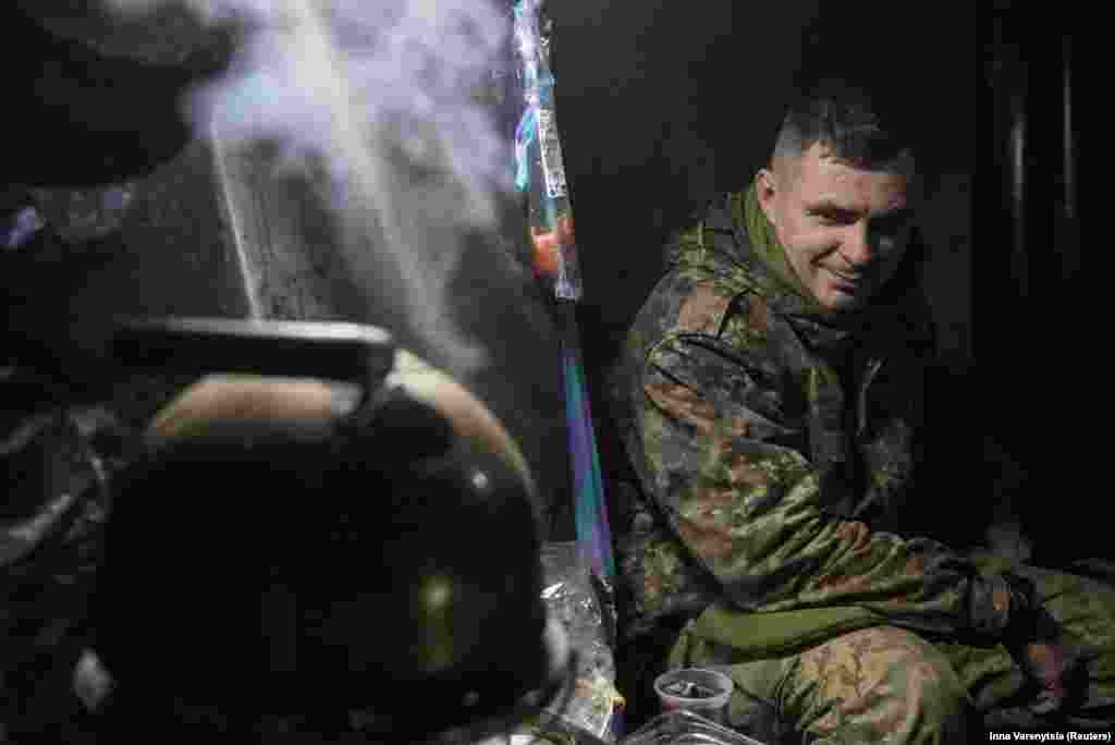 A kettle of&nbsp;boiling water captures the attention of a Ukrainian soldier in his dugout. &ldquo;If we won&rsquo;t have a single bullet, we will kill them with shovels,&rdquo; said Serhiy, a commander in the 59th Brigade, which is active in the eastern city of Avdiyivka, who spoke on condition that only his first name be used.&nbsp;