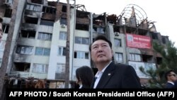 Президент Южной Кореи Юн Сок Ёль в Ирпене, Киевская область, 15 июля 2023 года. 