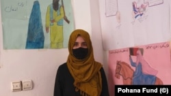 A female student attends a clandestine school in southern Afghanistan.
