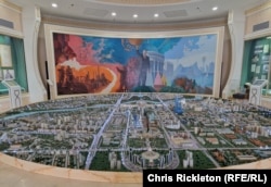 A painting that shows Nazarbaev's journey from steelworker to planner-in-chief of Kazakhstan's capital, Astana, in a Temirtau museum dedicated to the former president.