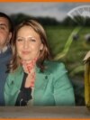 Graphics with Emilia Zaeva Kostova and Atanas Kostov and a jar with gherkins