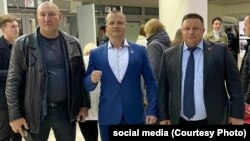 Сяргей Аўтуховіч з кіраўніком менскага АМАПу Дзьмітрыем Балабам і памочнікам Лукашэнкі, інспэктарам па Менску Аляксандрам Барсуковым