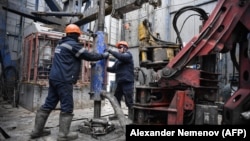 RUSSIA - Employees work at a gas drilling rig at the Bovanenkovo gas field on the Yamal peninsula in the Arctic circle on May 21, 2019.