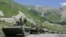 A convoy of Russian troops makes its way through the mountains toward the conflict between Georgian troops and separatist South Ossetian troops on August 9, 2008. 