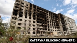 Разрушенный российским ракетным ударом жилой дом в городе Орехове в Запорожской области Украины, 7 сентября 2023 года