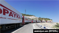 An Armenian convoy of aid trucks that has been blocked at an Azerbaijani checkpoint.