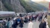 Бегущие от мобилизации россияне на границе с Грузией, сентябрь 2022 года