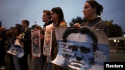 People take part in a demonstration near the Russian Embassy in Rome after the death of Russian opposition leader Aleksei Navalny on February 16.