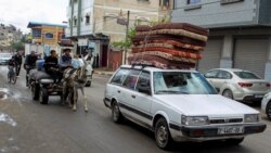 Palestinci napuštaju istočne kvartove grada Rafe, 6. maja 2024.<br />
<br />
Izraelska vojska je pozvala civile da se premjeste u humanitarnu zonu al-Mawasi&nbsp;i područje Khan Yunisa, prenose izraelski mediji.