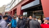 Ukrainian men lining up to the passport service in Prague after the new mobilization law was adopted in Ukraine. April 15, 2024
