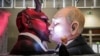 A carnival float depicts Russian President Vladimir Putin kissing the devil at a parade in Cologne, Germany, on February 14.