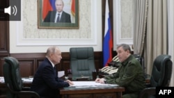Президент России Владимир Путин и начальник Генерального штаба ВС России Валерий Герасимов 