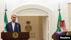 Iran's Foreign Minister Hossein Amir-Abdollahian (left) and Saudi Arabia's Foreign Minister Prince Faisal bin Farhan hold a press conference in Riyadh on August 17.