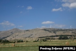 Wind turbines from the Chinese-owned Ivovik project dot a hill in Livno, Bosnia-Herzegovina.
