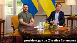 Ukrainian President Volodymyr Zelenskiy (left) meets Swedish Prime Minister Ulf Kristersson at his country retreat in Harpsund, Sweden, in August 2023.