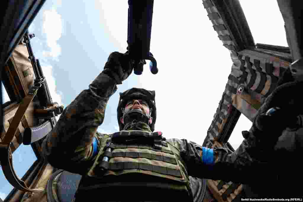 A Ukrainian soldier mans his machine gun in a MaxxPro MRA armored personnel carrier.&nbsp;Ukrainian President Volodymyr Zelenskiy has vowed that his country will retake all its territory as Kyiv continues its &quot;de-occupation steps.&quot;