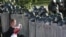 Riot police block a street during an opposition rally in Minsk in September 2020. 
