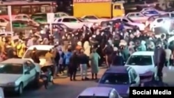 Videos published on social networks showed gatherings in several Tehran neighborhoods with people chanting, "We will stand till the end!" and, "Death to the dictator!"