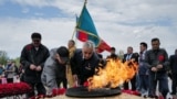People take part in World War II Victory Day commemorations in the Kazakh capital, Astana, on May 9.